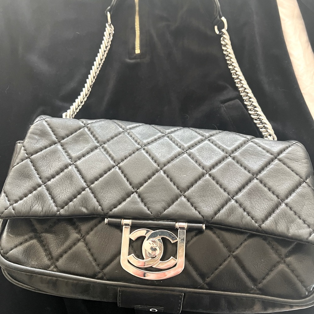 Chanel Classic Flap Shoulder Bag – Medium: 10″ W x 6.3″ H x 3″ D